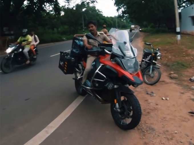 Tamil Nadu cops stopped biker on BMW superbike To click photos Video Goes Viral
