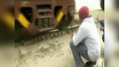 वीडियो: महिला ट्रेन के नीचे से पार कर रही थी रेलवे ट्रैक, तभी चल पड़ी ट्रेन