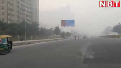 Delhi NCR Weather Update: धुएं और धुंध की मोटी चादर से घिरा दिल्ली-एनसीआर, पारा भी गिरा