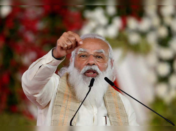 FILE PHOTO: India&#39;s PM Modi addresses a gathering before flagging off the &quot;Dandi March&quot;, in Ahmedabad