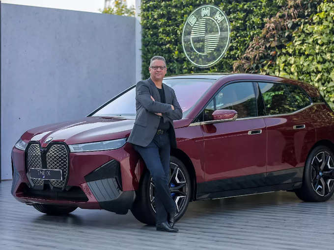 Vikram Pawah, President, BMW Group India with the BMW iX