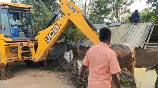 ஆக்கிரமிப்பை இடிக்க வந்த அதிகாரிகள்... ஆட்டம் காட்டிய ஆசாமி!