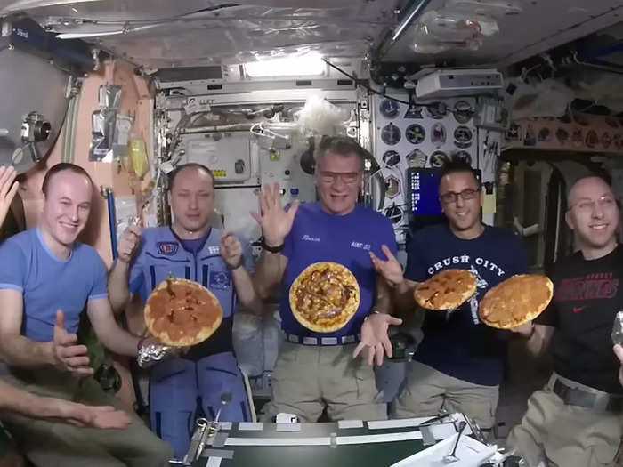 astronaut eating in space