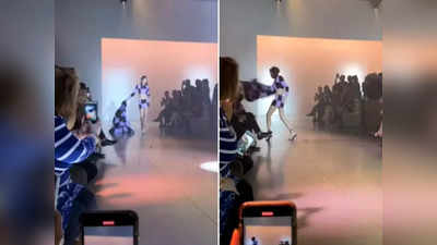 रैंप पर चलते हुए महिला मॉडल ने कोट से दर्शक को मारा, वीडियो वायरल