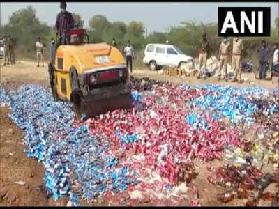 గోవిందా.. 60 వేలకుపైగా మద్యం సీసాలు,  డబ్బాలను తొక్కించేశారు