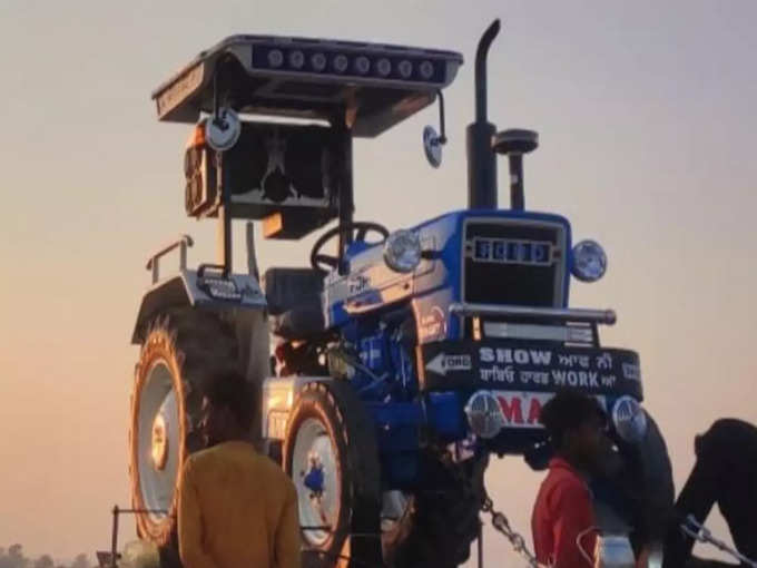 farmer son got tractor placed on the roof news