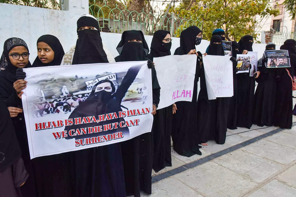 Hyderabad: Muslim women holding placards participate in a mass prayer congregati...