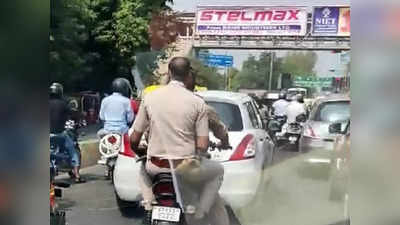 Daroga Challan: दारोगा जी का कटा 14 हजार का चालान, इयरफोन लगाकर बिना हेल्मेट गाड़ी चलाना पड़ा महंगा
