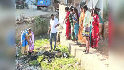 கழிவு நீரில் பெண் கவுன்சிலர்; பதறிய அதிகாரிகள்!