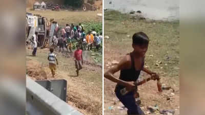 Video: दारुचा ट्रक रस्त्यावर पलटी, ड्रायव्हरला ढकलून अख्ख्या गावानं पळवल्या बाटल्या