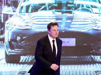 Tesla Share Price : तीन गुना तक सस्ते हो रहे टेस्ला के शेयर, जानिए कैसे खरीद सकते हैं आप