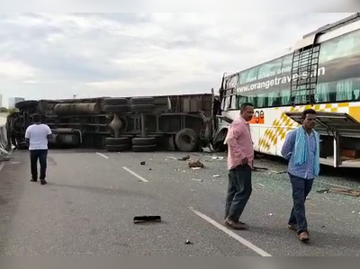 ఆరెంజ్ ట్రావెల్స్ బస్సు బీభత్సం.. హైవేపై బోల్తా పడ్డ లారీ