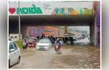 Noida Rain: नोएडा की कई सड़कों पर भरा बारिश का पानी, लंबे जाम के झाम से परेशान हो रहे लोग, देखें तस्वीरें