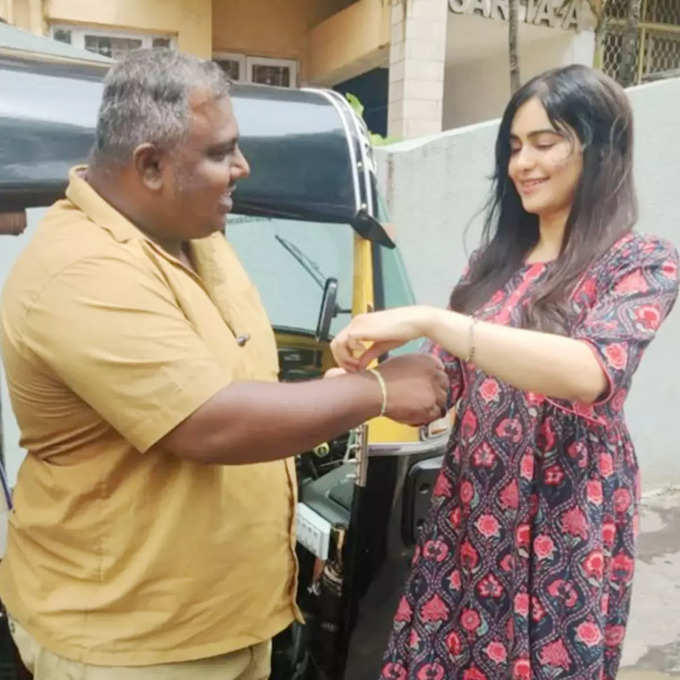 adah sharma ties rakhi to auto driver pic