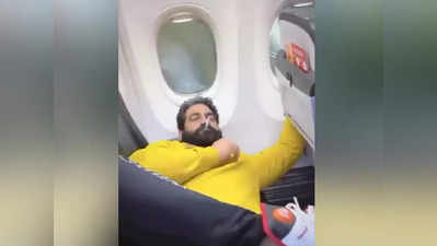 Spicejet విమానం సీటులో పడుకుని దర్జాగా దమ్ముకొట్టిన బాడీబిల్డర్.. జనం షాక్.. వీడియో వైరల్