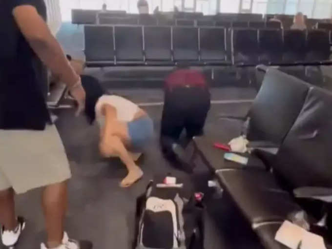 man fighting in airport with woman video