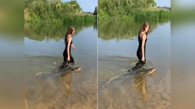 पहले मगरमच्छ के गले डाला पट्टा, फिर उसे पानी में पालतू जानवर की तरह से लेकर चलने लगी महिला