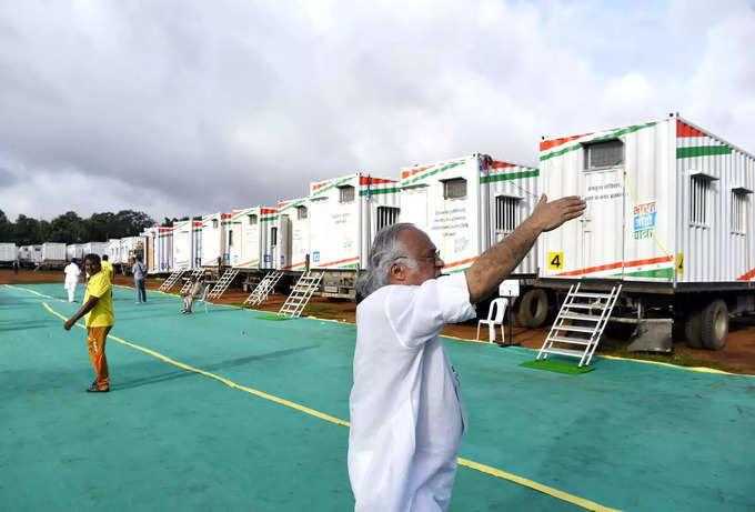 Congress leader Jairam Ramesh inspects the container