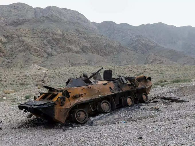 FILE PHOTO_ A view shows a burnt armoured vehicle of Kyrgyz forces near a water distribution facility in Batken province.