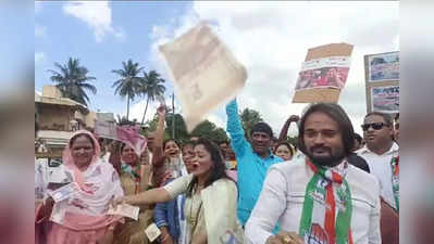 Congress Protest - ಬೆಳಗಾವಿಯಲ್ಲಿ ನೂತನವಾಗಿ ಉದ್ಘಾಟನೆಗೊಂಡಿದ್ದ ರಸ್ತೆಯ ಮೇಲೆ ನಕಲಿ ನೋಟು ಸುರಿದು ಕಾಂಗ್ರೆಸ್ ಪ್ರತಿಭಟನೆ