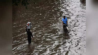 Heavy Rain in Tumakuru | ಧಾರಾಕಾರ ಮಳೆಗೆ ತುಮಕೂರು ತತ್ತರ: ತುಂಬಿ ಹರಿದ ಹೆಬ್ಬಾಕ ಕೆರೆ, ರಾ.ಹೆ ಜಲಾವೃತ