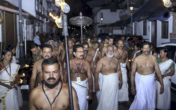 Thiruvananthapuram: People participate in mannu neeru koral procession as part...