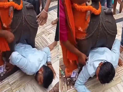 Gujarat: ఆలయంలో కష్టాల్లో పడ్డ భక్తుడు... విగ్రహం కింద ఇరుక్కుపోయి...