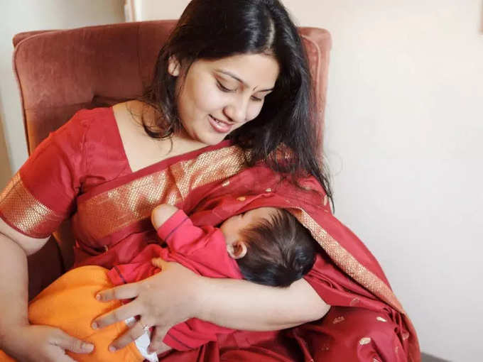 A mom breastfeeding her baby