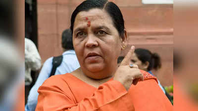 Uma Bharti: ಮದ್ಯ ಬಿಡ್ರಿ, ಹಾಲು ಕುಡಿರಿ; ಬಾರ್‌ ಮುಂದೆ ಹಸು ಕಟ್ಟಿ ಉಮಾಭಾರತಿ ಕರೆ!