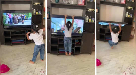 girl brings down tv while dancing to song in viral video
