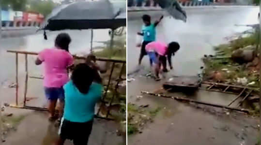 a video showing kids covering a pothole has gone viral on social media