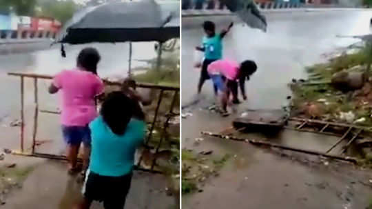 a video showing kids covering a pothole has gone viral on social media