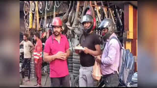 Dhanbad: हेलमेट पहन कई दुकानदार कर रहे व्यवसाय, देखिए क्यों है उनकी जान को खतरा