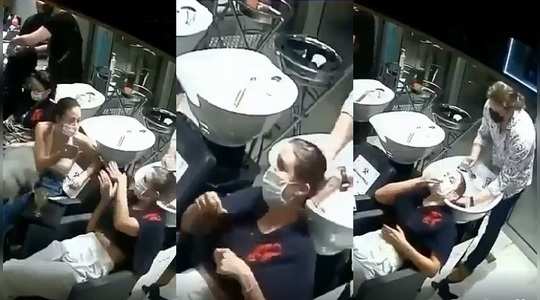 man splashes on the womans face after she continuously disturbing during hair washing