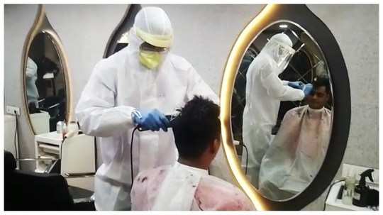 lockdown salon barbers wear ppe suits face shield