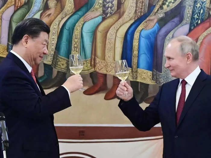 Putin hosts Xi