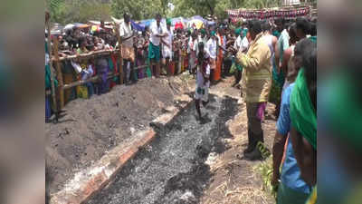 புகலூர் மாரியம்மன் கோவில் சித்திரை திருவிழா; குழந்தைகளை தோளில் சுமந்து பூக்குழி இறங்கி ஆயிரக்கணக்கானோர் நேர்த்திக்கடன்!