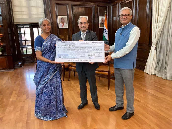 SBI pays highest-ever dividend of over Rs 5,700 cr to govt; SBI Chairman Khara hands over cheque to FM Sithara