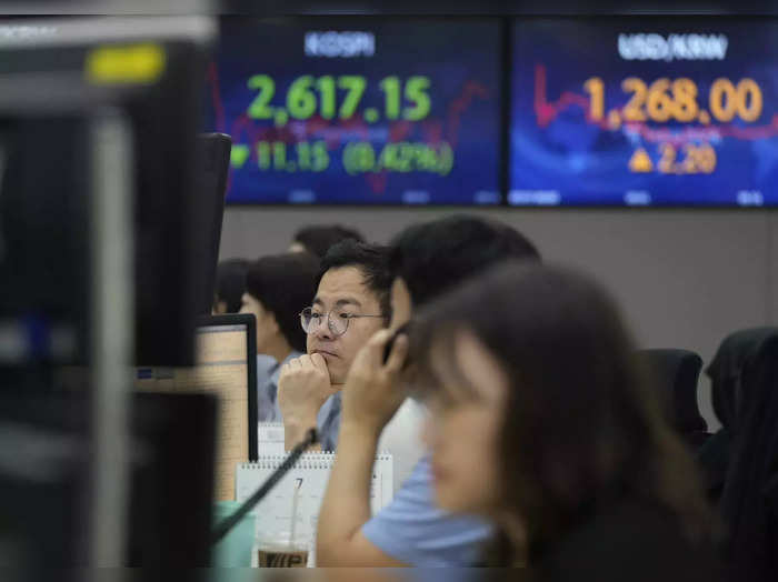 China cuts tax on stock trading to boost market confidence.