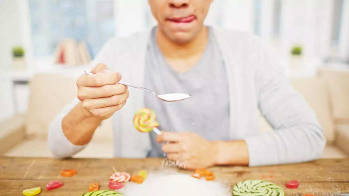 Man eating sweets