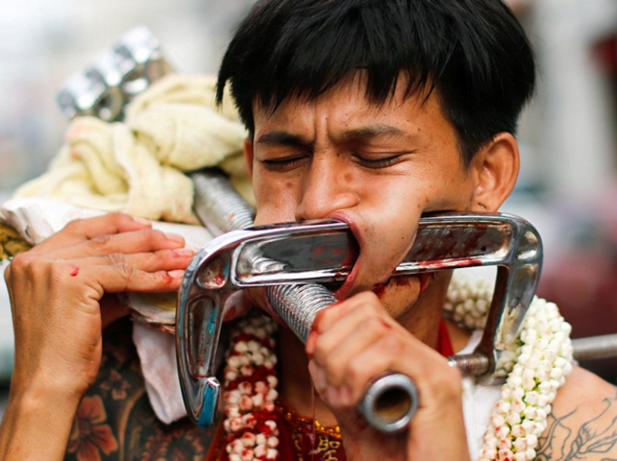 Shockingly Brutal Rituals Of Devotees At Asian Vegetarian Festival Navbharat Times Photogallery