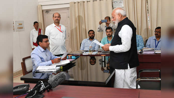 Uttar Pradesh, April 26 ( ANI) :   Prime Minister Narendra Modi  filing his nomination at the Collectorate office in Varanasi on Friday. (ANI Photo)