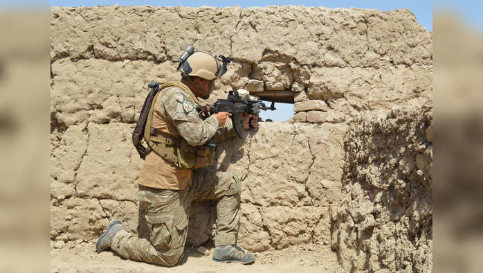 A member of Afghan security force takes position during a battle with the Taliban in Kunduz province, Afghanistan September 1, 2019. REUTERS/Stringer   NO RESALES. NO ARCHIVES