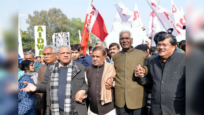 New Delhi, Jan 09 (ANI): CPI(M) General Secretary Sitaram Yechury along with Sharad Yadav, D Raja, and other leaders join JNU students' protest march demanding the removal of the university vice-chancellor, at Mandi House in New Delhi on Thursday. (ANI Photo)