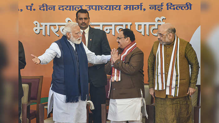 New Delhi: Prime Minister Narendra Modi with newly elected BJP National President JP Nadda (C), after the latter was elected as the new chief of the BJP unit unopposed, at BJP HQ in New Delhi, Monday, Jan. 20, 2020.Union Home Minister Amit Shah (R) is also seen. (PTI Photo/Kamal Kishore)(PTI1_20_2020_000208A)