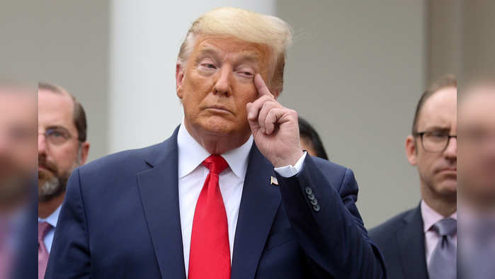 U.S. President Donald Trump pauses during a news conference where he declared the coronavirus pandemic a national emergency in the Rose Garden of the White House in Washington, U.S., March 13, 2020. REUTERS/Jonathan Ernst     TPX IMAGES OF THE DAY