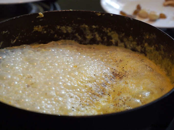 Add sugar and boil the kheer Add sugar and boil the kheer