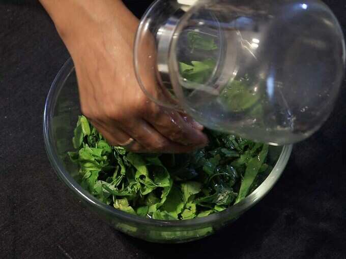 add water and greens in a pan add water and greens in a pan