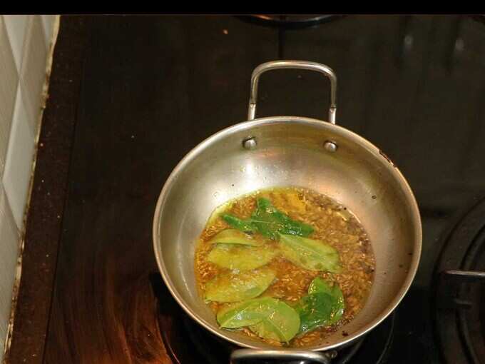turmeric, few curry leaves and saute turmeric, few curry leaves and saute