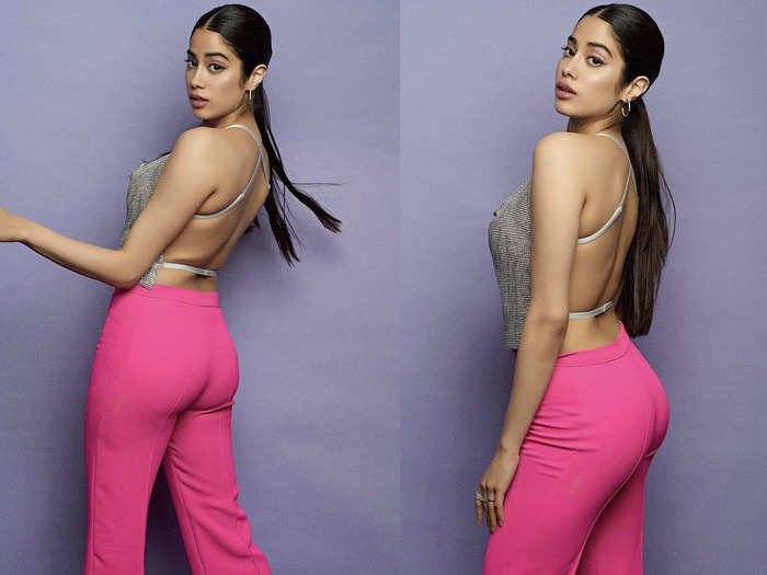 janhvi kapoor looks drop dead gorgeous in pink pants and silver backless top